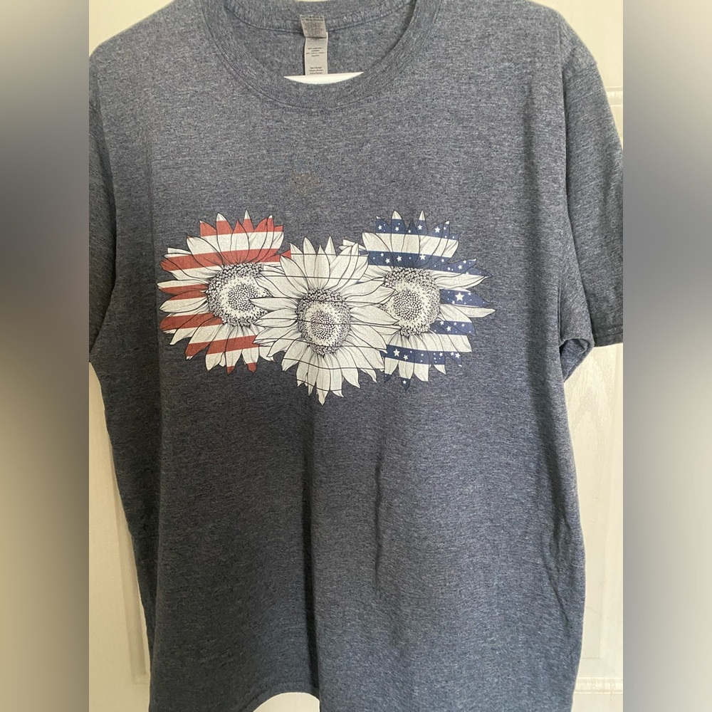Patriotic t-shirt with red white and blue daisies.